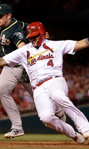 Weaver gets 1st big-league win as Cardinals beat A's